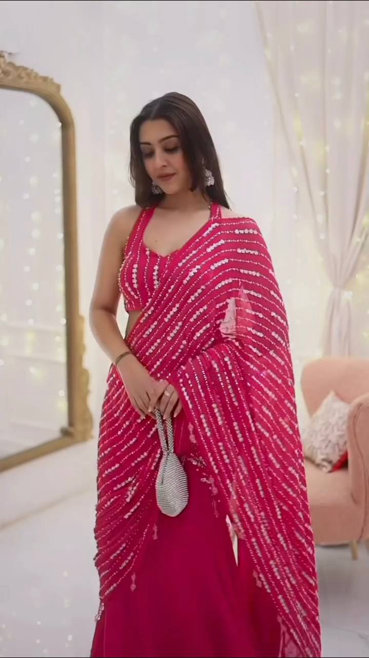 Radiant Rani Pink Silk Lehenga Choli Adorned with Opulent Heritage Floral Motifs and Intricate Zari Borders